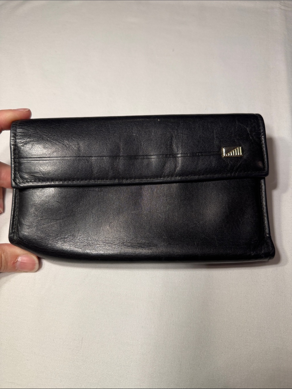 Black Leather Foldover Clutch with Subtle Metal Accent